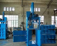 Single chamber textile baler