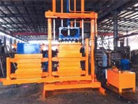 Twin chamber textile baler